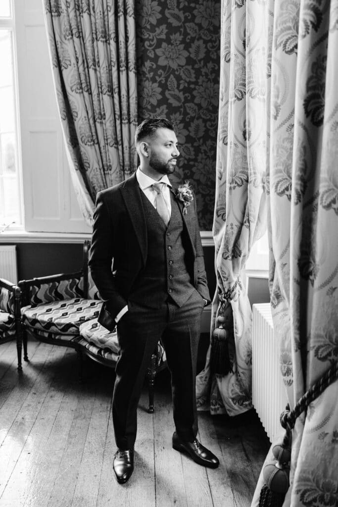 groom portrait in drawing room at offley place