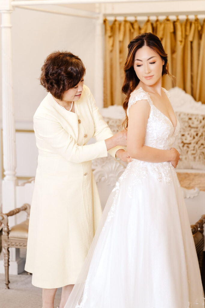 bride getting ready in bridal suite at holmewood hall