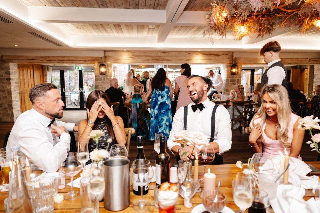 guests during drinks reception at wild thyme and honey in the cotswolds