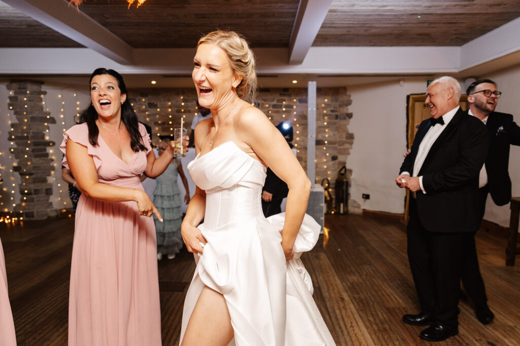 guests dancing during evening wedding reception at wild thyme and honey cotswolds