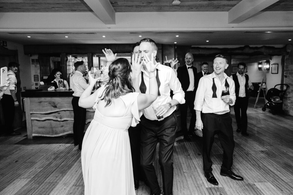 guests dancing during evening wedding reception at wild thyme and honey cotswolds